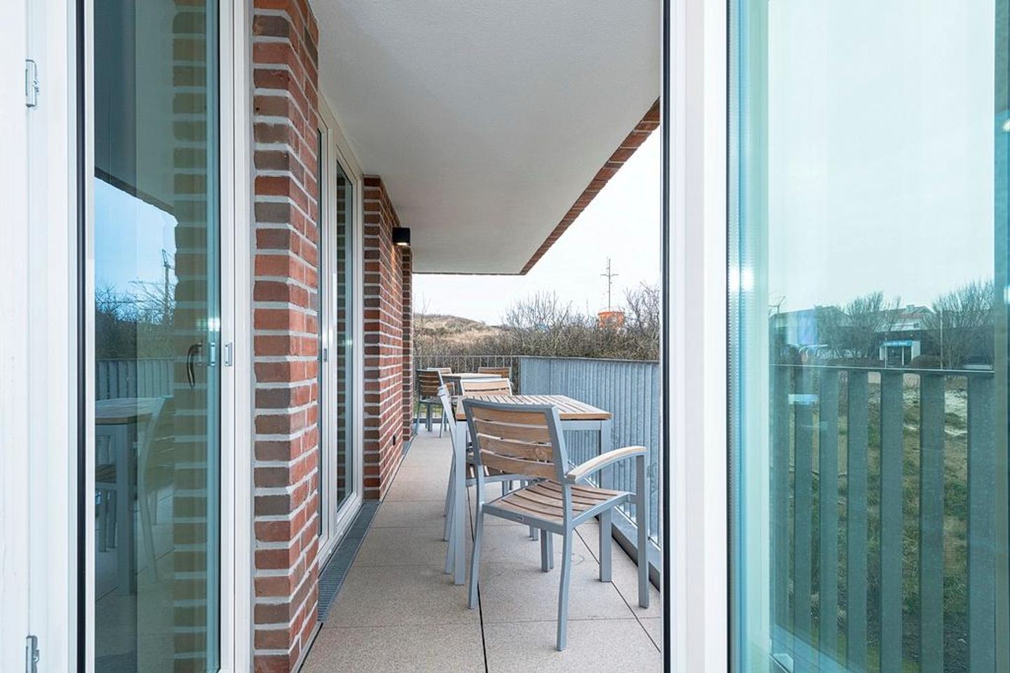 Apartmentvilla Anna See Apartmentvilla Anna See 2-10 Langeoog - Balkon mit Gartenmöbeln