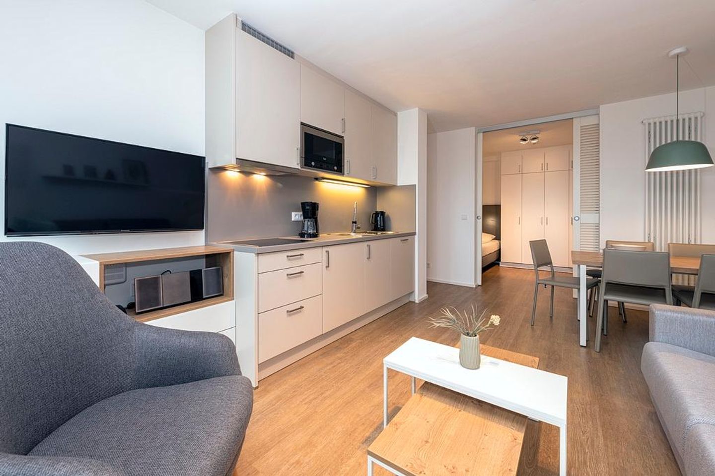 Apartmentvilla Anna See Apartmentvilla Anna See 2-11 Langeoog - Wohn-Essbereich mit Couch