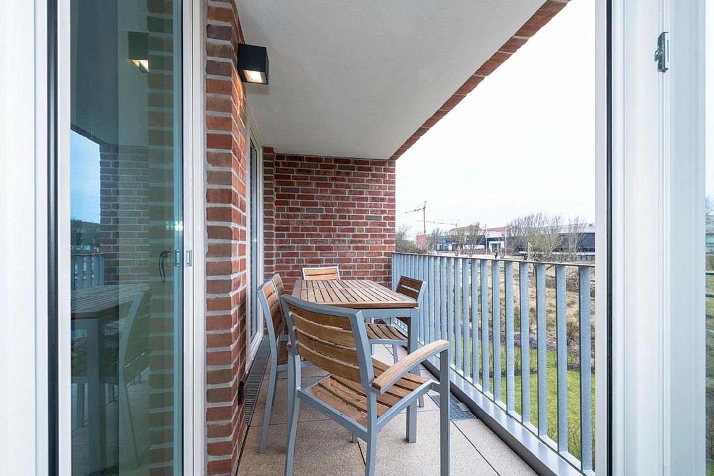 Apartmentvilla Anna See Apartmentvilla Anna See 2-11 Langeoog - Balkon mit Gartenmöbeln