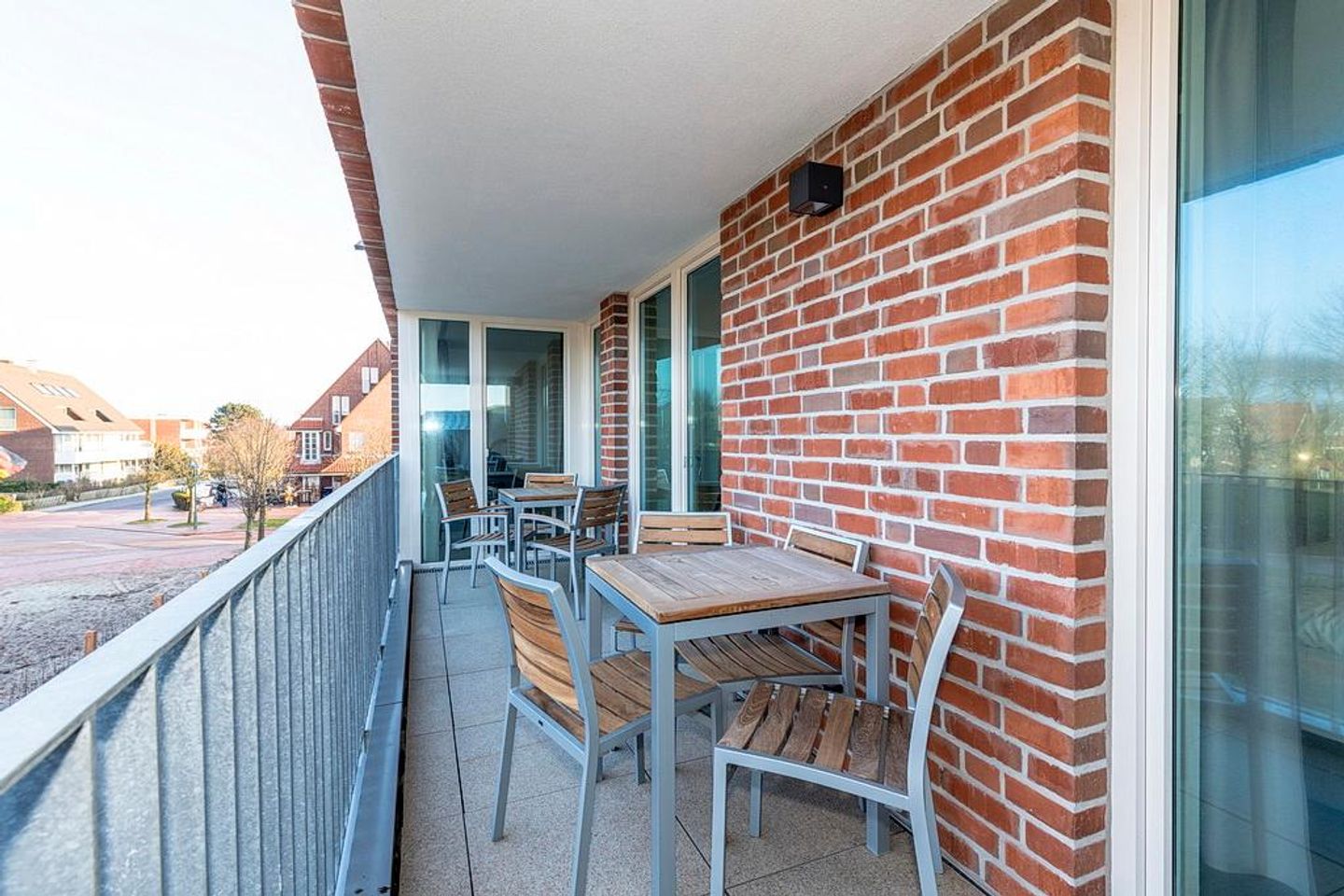 Apartmentvilla Anna See Apartmentvilla Anna See 2-13 Langeoog - Überdachter Balkon mit Sitzgelegenheit