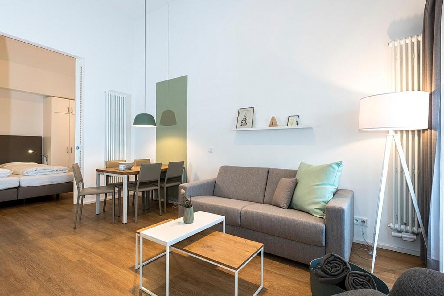 Apartmentvilla Anna See Apartmentvilla Anna See 3-11 Langeoog - Wohn-Essbereich mit Esstisch und Sitzgelegenheit