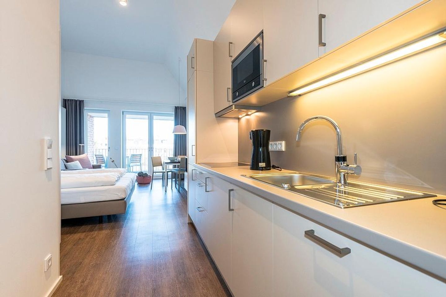 Apartmentvilla Anna See Apartmentvilla Anna See 3-14 Langeoog - Wohn-Schlafbereich mit Küchenzeile