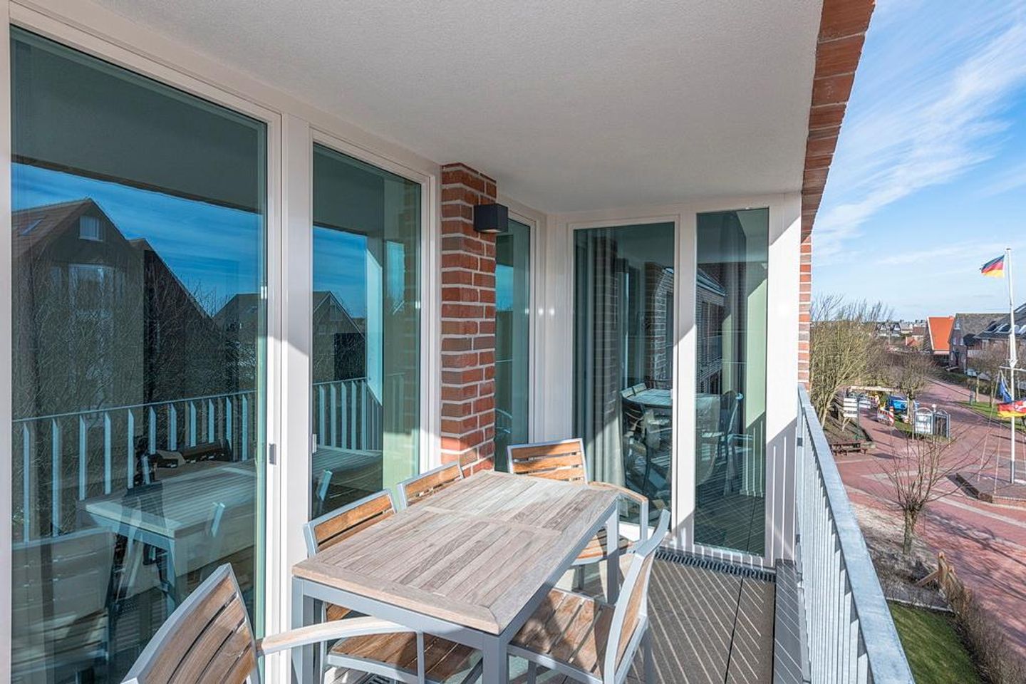 Apartmentvilla Anna See Apartmentvilla Anna See 3-16 Langeoog - Überdachter Balkon mit Sitzgelegenheit