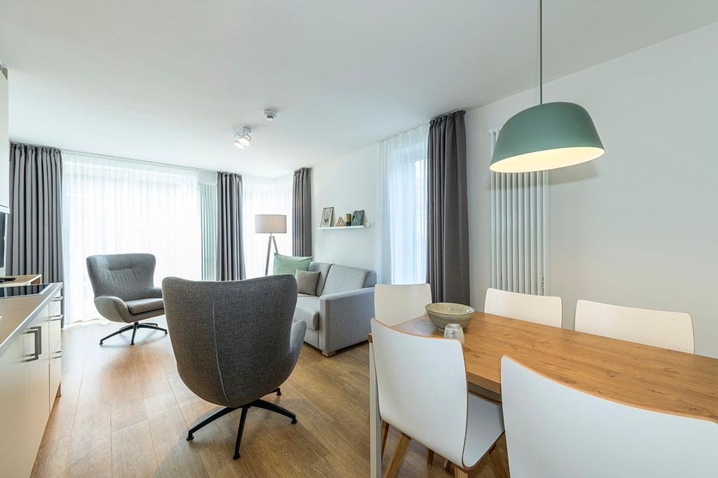 Apartmentvilla Anna See Apartmentvilla Anna See 1-10 Langeoog - Wohnbereich mit Couch und Sessel