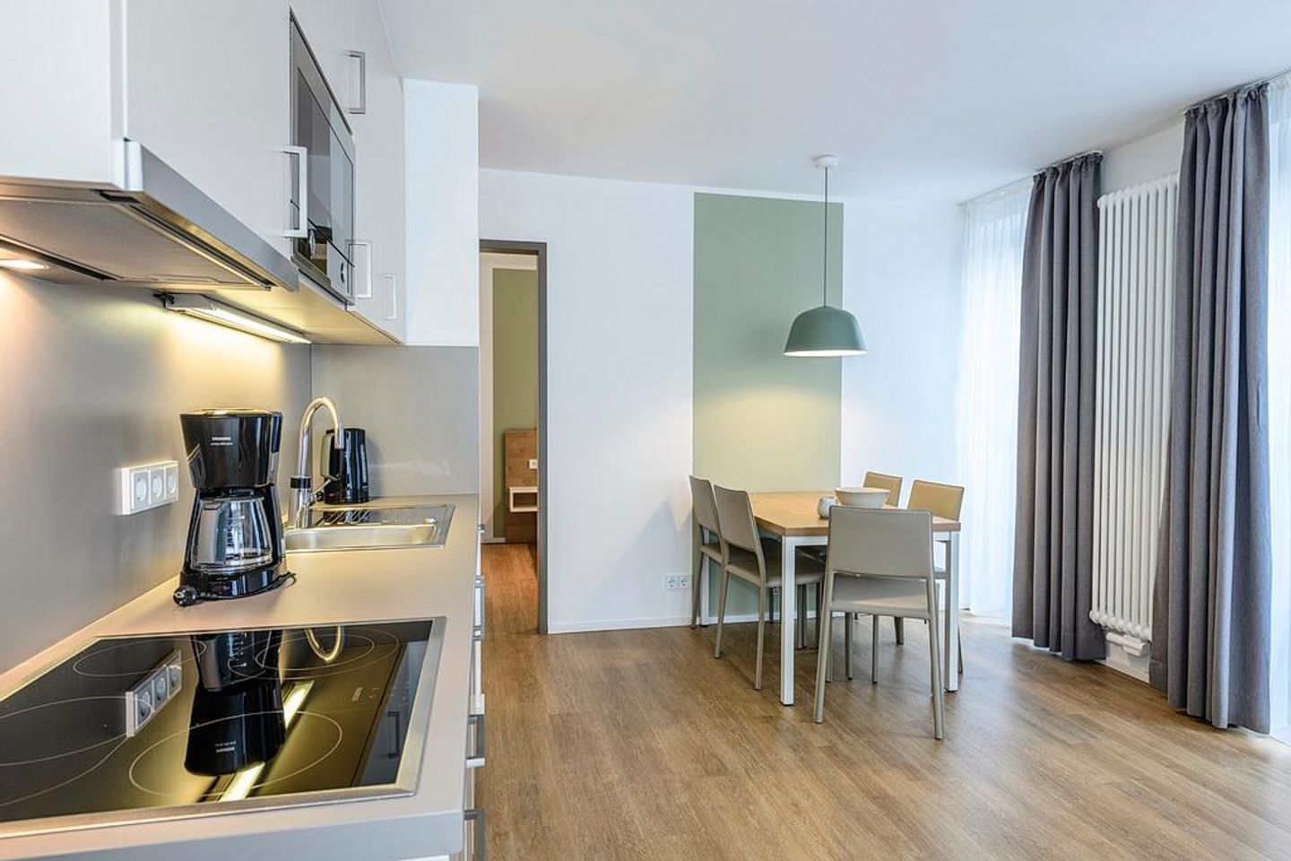 Apartmentvilla Anna See Apartmentvilla Anna See 1-11 Langeoog - Wohn-Essbereich mit Esstisch