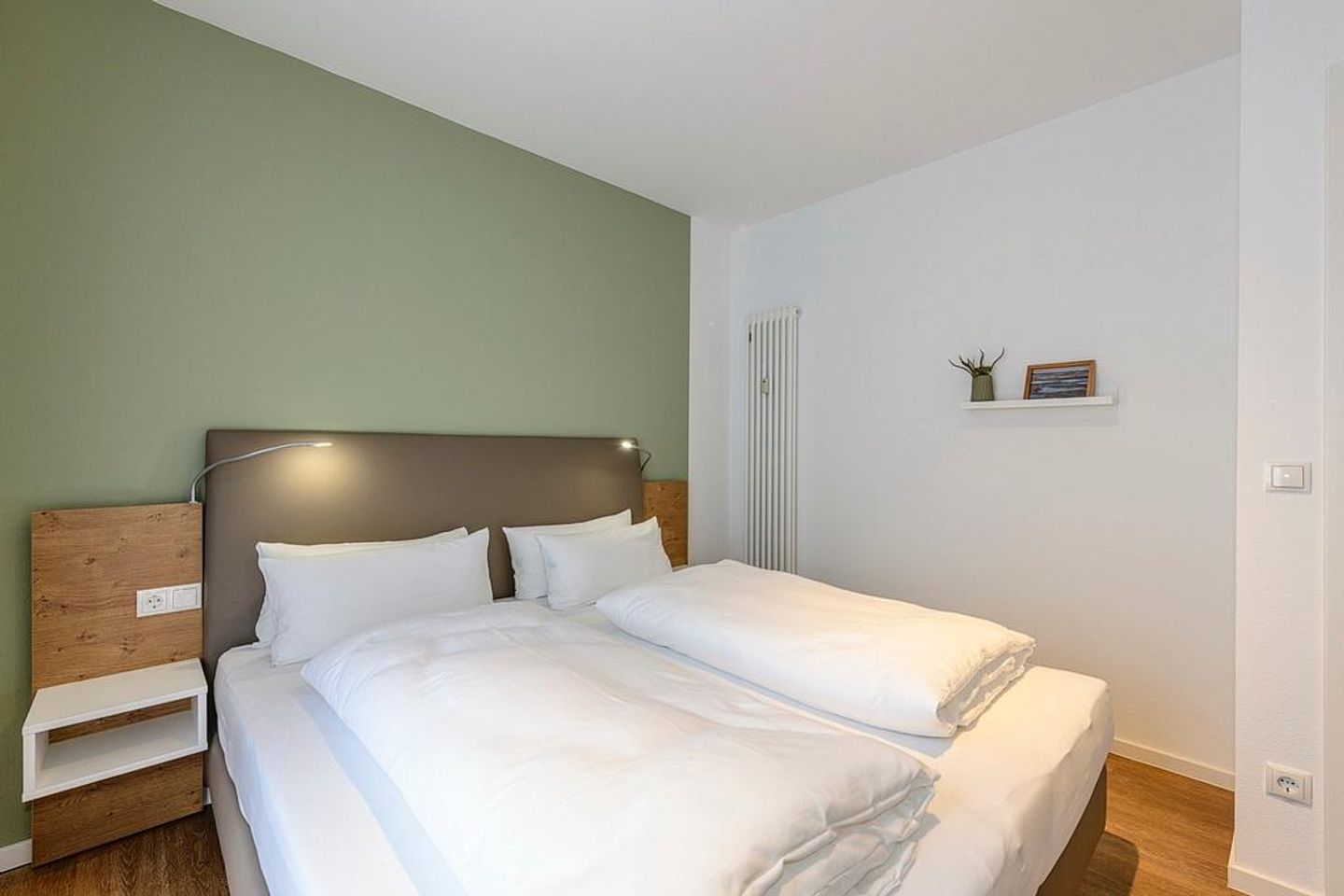 Deichhäuser Anna Küste Deichhäuser Anna Küste 1-10 Bensersiel - Schlafzimmer mit Doppelbett