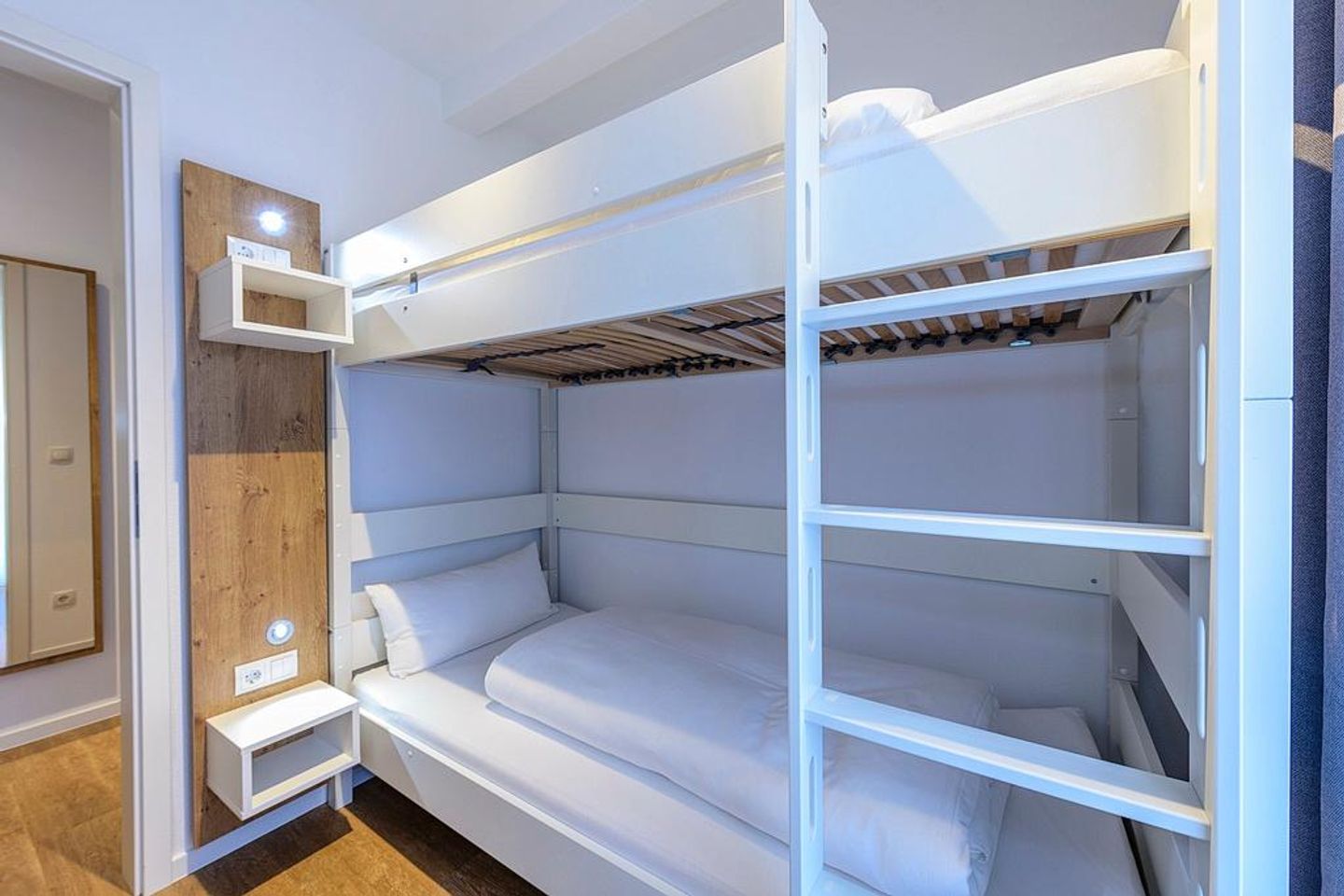 Deichhäuser Anna Küste Deichhäuser Anna Küste 1-10 Bensersiel - Schlafzimmer mit Stapelbett