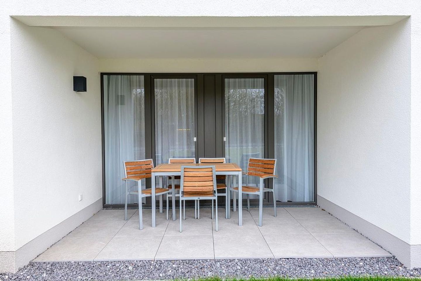 Deichhäuser Anna Küste Deichhäuser Anna Küste 1-10 Bensersiel - Terrasse mit Sitzgelegenheiten