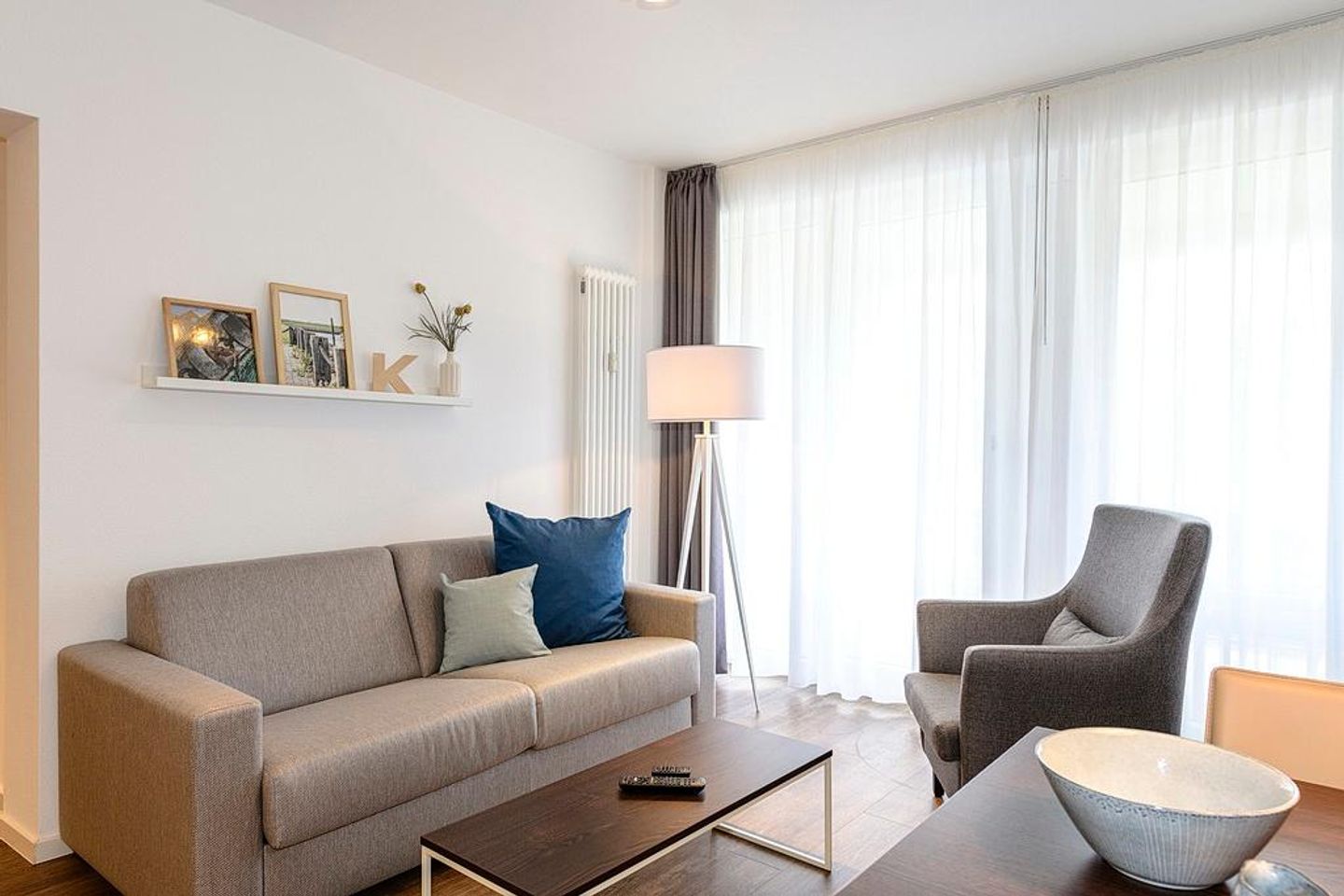 Deichhäuser Anna Küste Deichhäuser Anna Küste 1-11 Bensersiel - Wohn/Essbereich mit Couch und Sessel