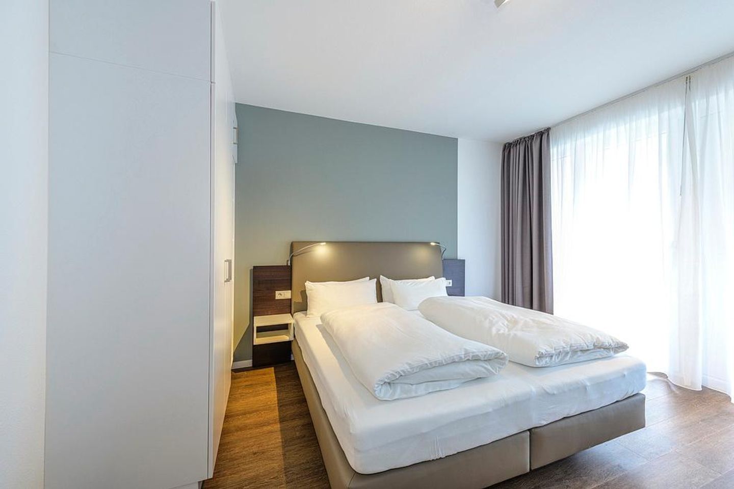 Deichhäuser Anna Küste Deichhäuser Anna Küste 1-11 Bensersiel - Schlafzimmer mit Doppelbett