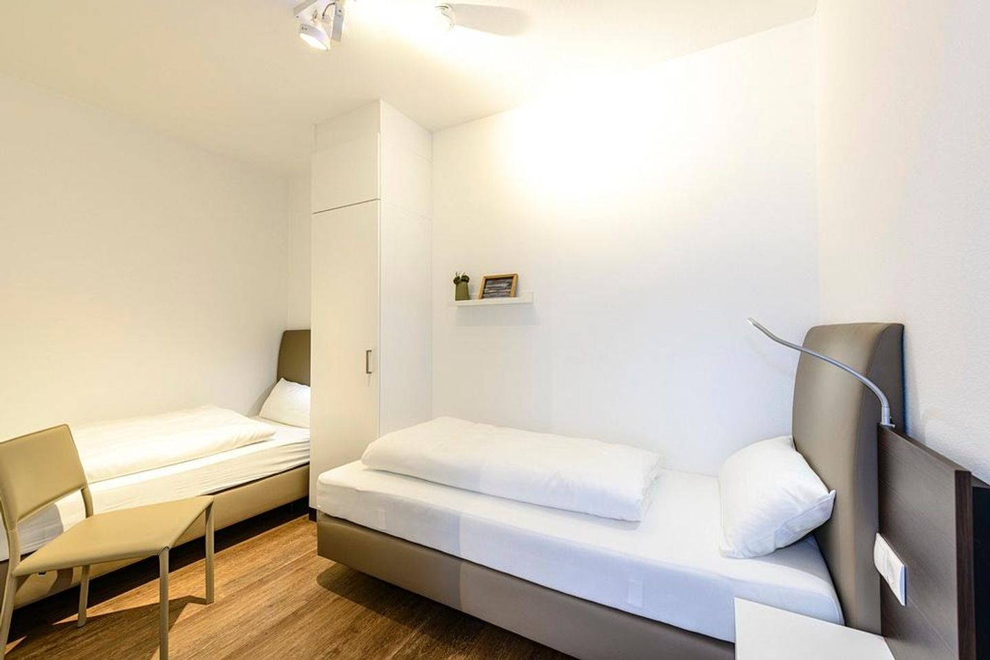 Deichhäuser Anna Küste Deichhäuser Anna Küste 1-11 Bensersiel - Schlafzimmer mit zwei Einzelbetten