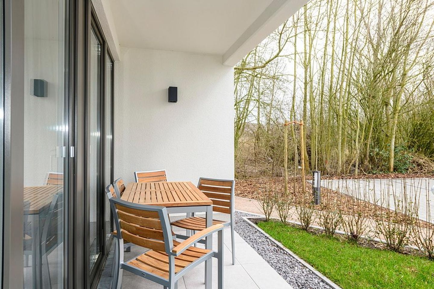 Deichhäuser Anna Küste Deichhäuser Anna Küste 1-14 Bensersiel - Terrasse mit Garten und Sitzgelegenheiten