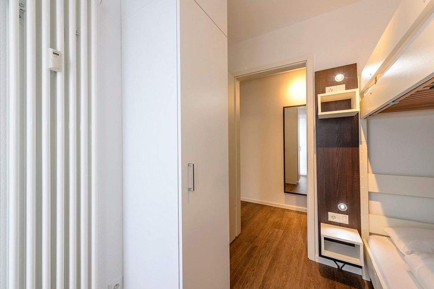 Deichhäuser Anna Küste Deichhäuser Anna Küste 1-20 Bensersiel - Schlafzimmer mit Stapelbett