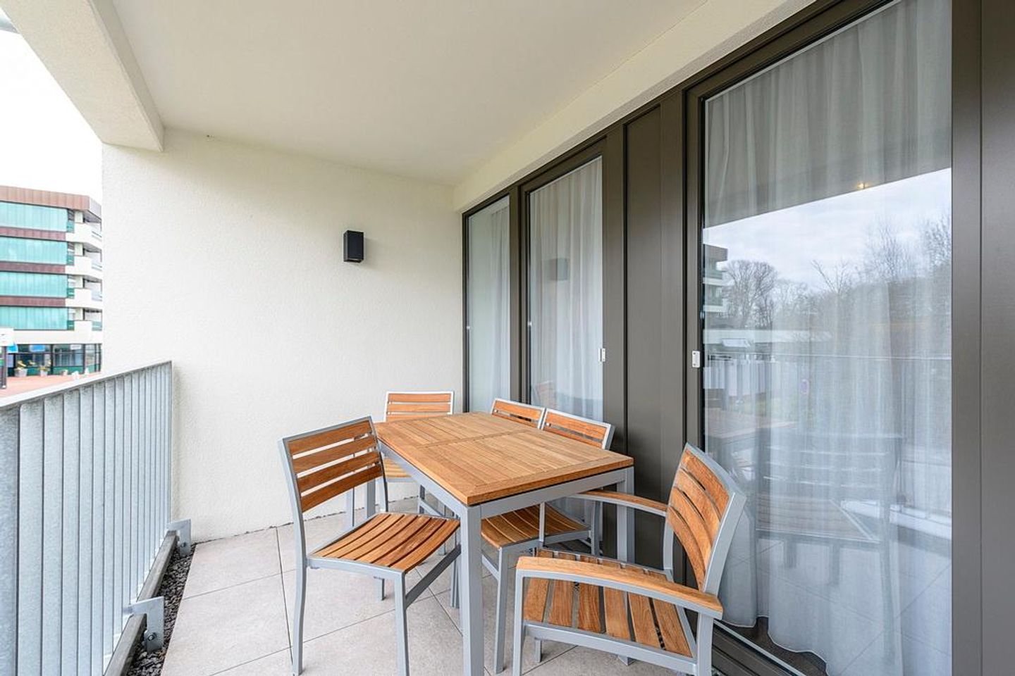 Deichhäuser Anna Küste Deichhäuser Anna Küste 1-20 Bensersiel - Balkon mit Sitzgelegenheiten