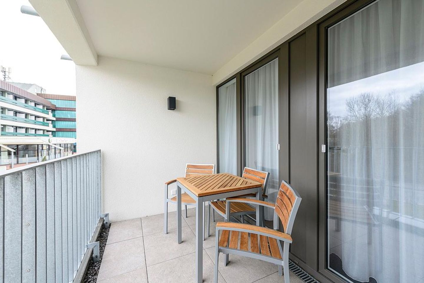 Deichhäuser Anna Küste Deichhäuser Anna Küste 1-22 Bensersiel - Balkon mit Sitzgelegenheiten