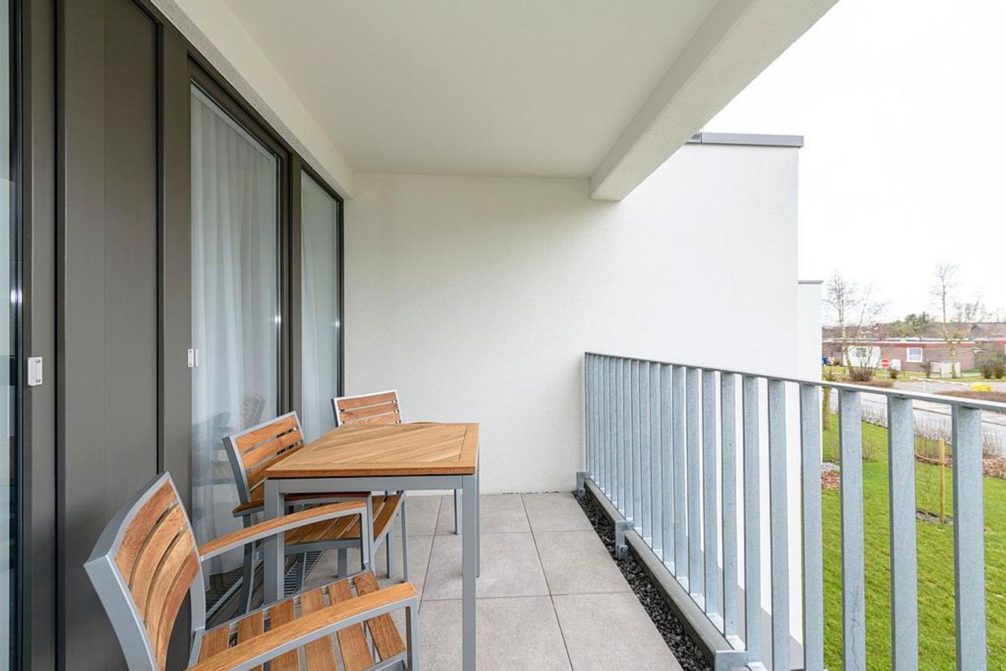 Deichhäuser Anna Küste Deichhäuser Anna Küste 1-22 Bensersiel - Balkon mit Sitzgelegenheiten