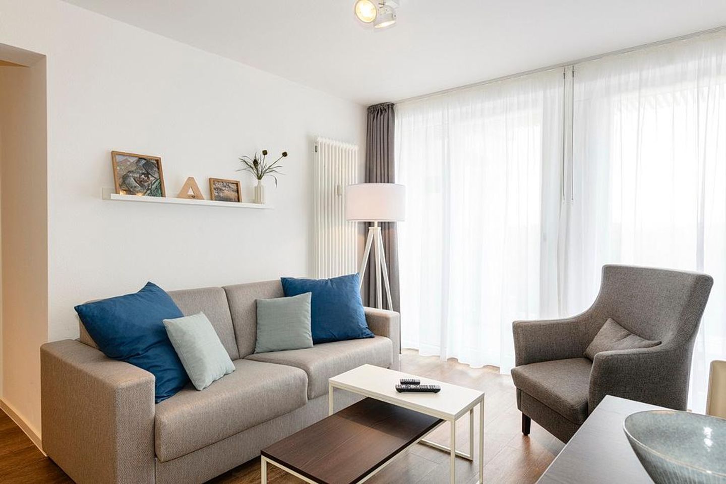 Deichhäuser Anna Küste Deichhäuser Anna Küste 1-31 Bensersiel - Wohn/Essbereich mit Sessel und Couch