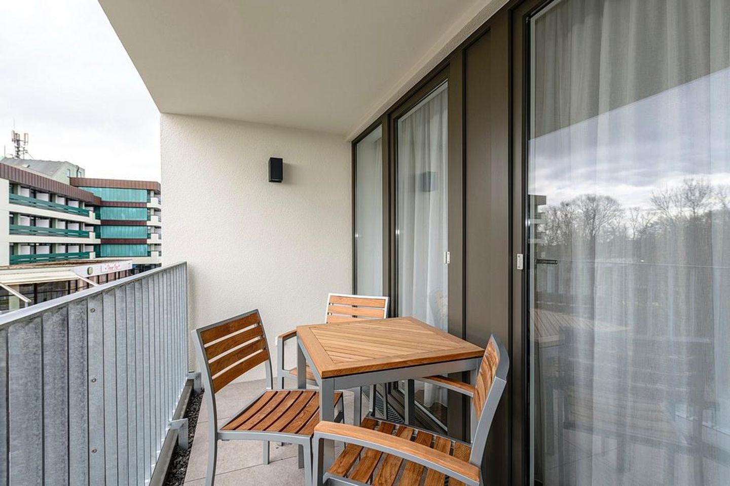Deichhäuser Anna Küste Deichhäuser Anna Küste 1-32 Bensersiel - Balkon mit Sitzgelegenheiten