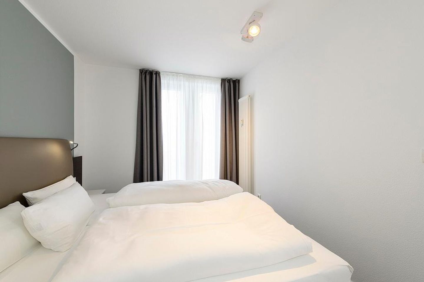 Deichhäuser Anna Küste Deichhäuser Anna Küste 1-33 Bensersiel - Schlafzimmer mit Doppelbett