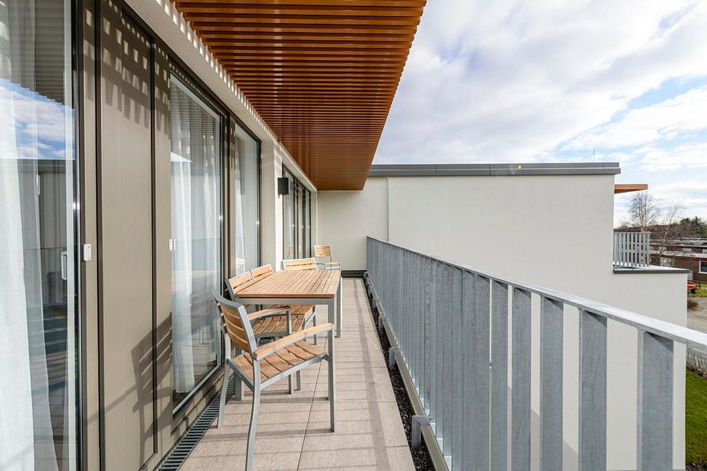 Deichhäuser Anna Küste Deichhäuser Anna Küste 1-33 Bensersiel - Balkon mit Sitzgelegenheiten