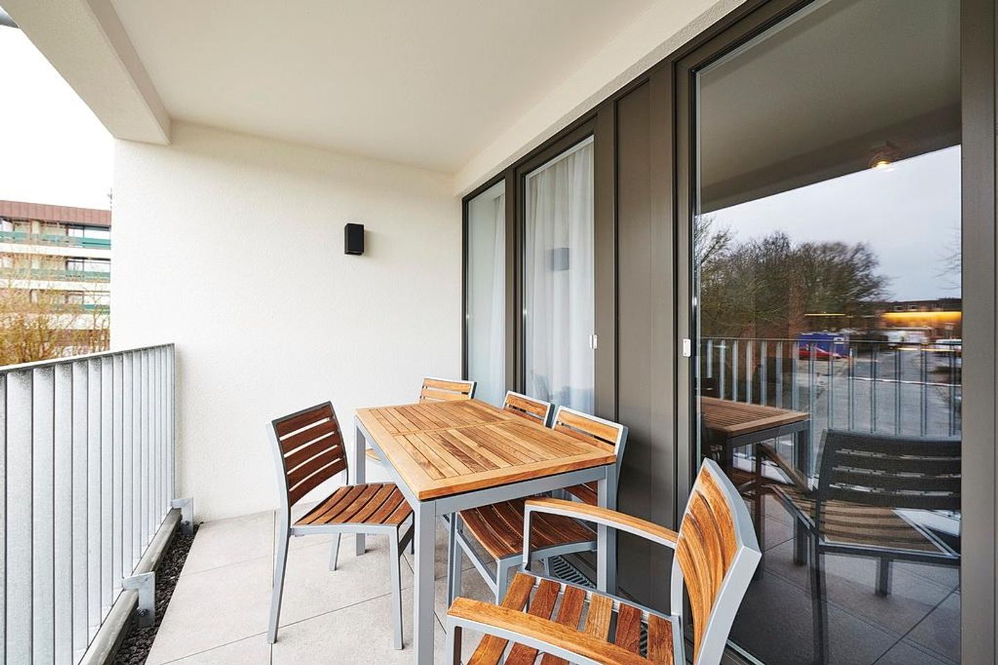 Deichhäuser Anna Küste Deichhäuser Anna Küste 2-20 Bensersiel - Balkon mit Sitzgelegenheiten