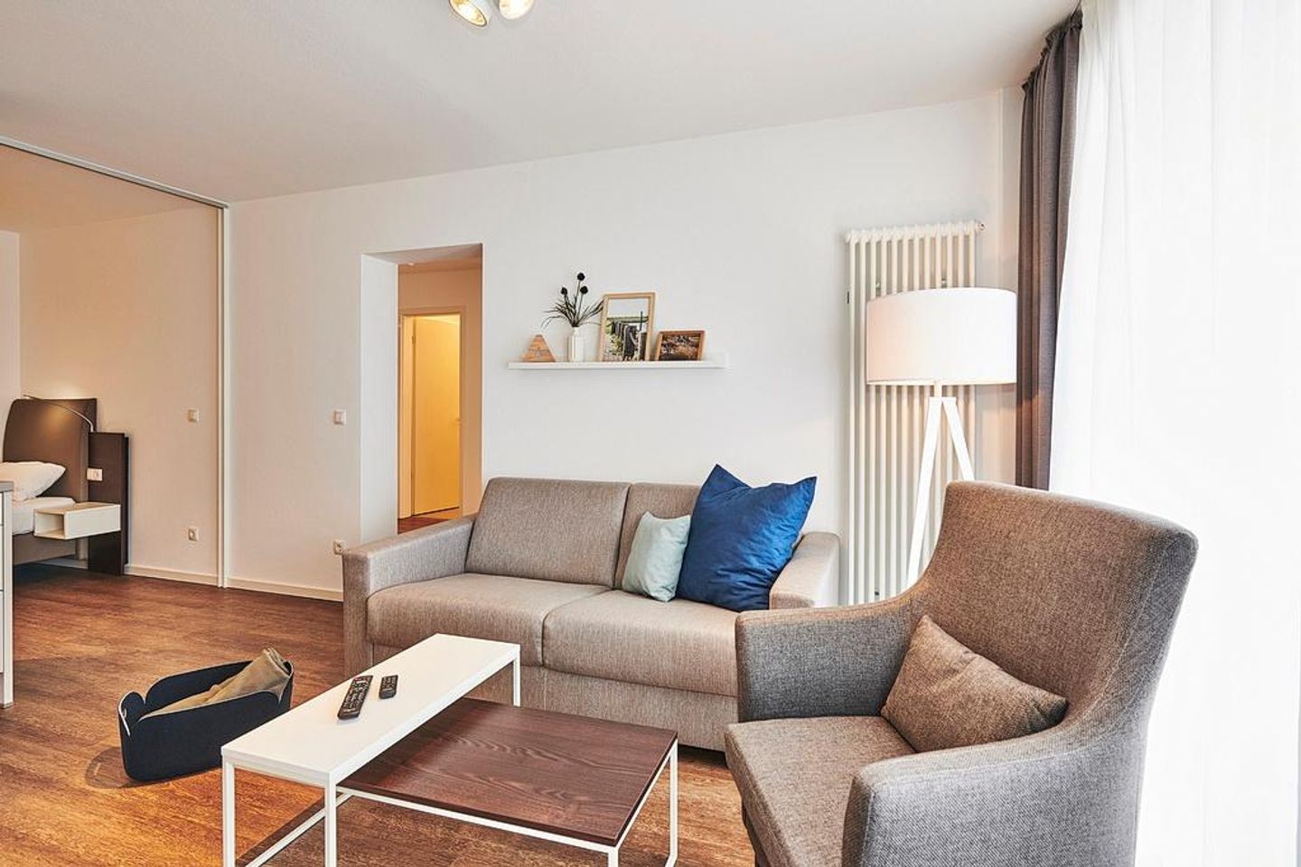 Deichhäuser Anna Küste Deichhäuser Anna Küste 2-21 Bensersiel - Wohn/Essbereich mit Couch und Sessel