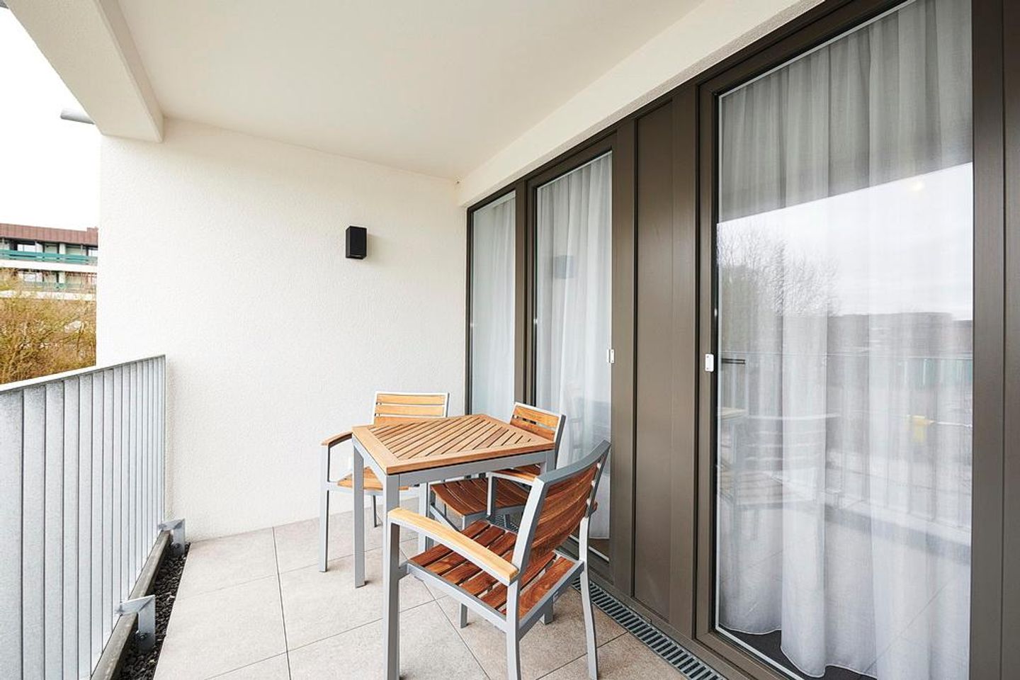 Deichhäuser Anna Küste Deichhäuser Anna Küste 2-22 Bensersiel - Balkon mit Sitzgelegenheiten