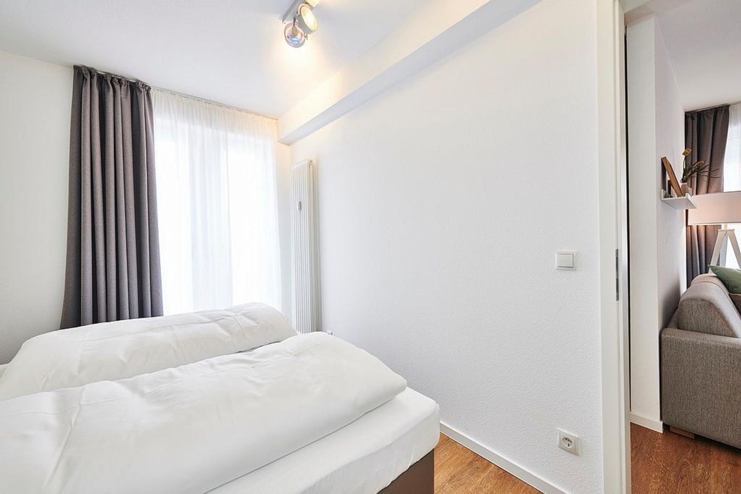 Deichhäuser Anna Küste Deichhäuser Anna Küste 2-23 Bensersiel - Schlafzimmer mit Doppelbett