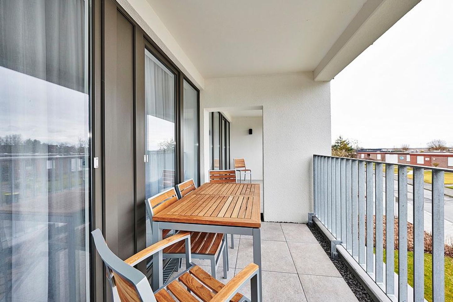 Deichhäuser Anna Küste Deichhäuser Anna Küste 2-23 Bensersiel - Balkon mit Sitzgelegenheiten