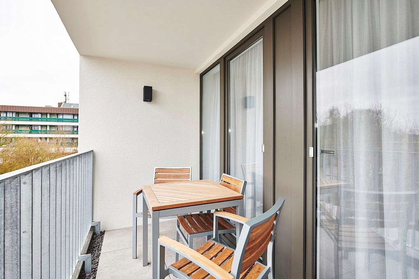 Deichhäuser Anna Küste Deichhäuser Anna Küste 2-32 Bensersiel - Balkon mit Sitzgelegenheiten