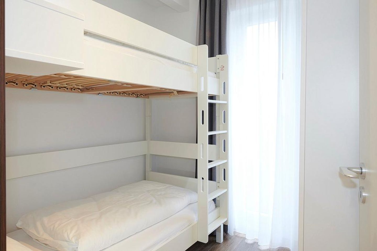 Deichhäuser Anna Küste Deichhäuser Anna Küste 3-10 Bensersiel - Schlafzimmer mit Stapelbett