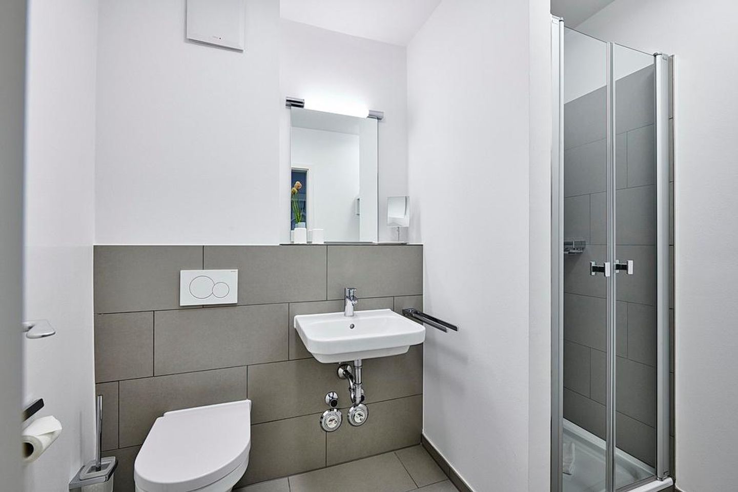 Deichhäuser Anna Küste Deichhäuser Anna Küste 3-11 Bensersiel - Badezimmer mit Dusche, Waschtisch und WC