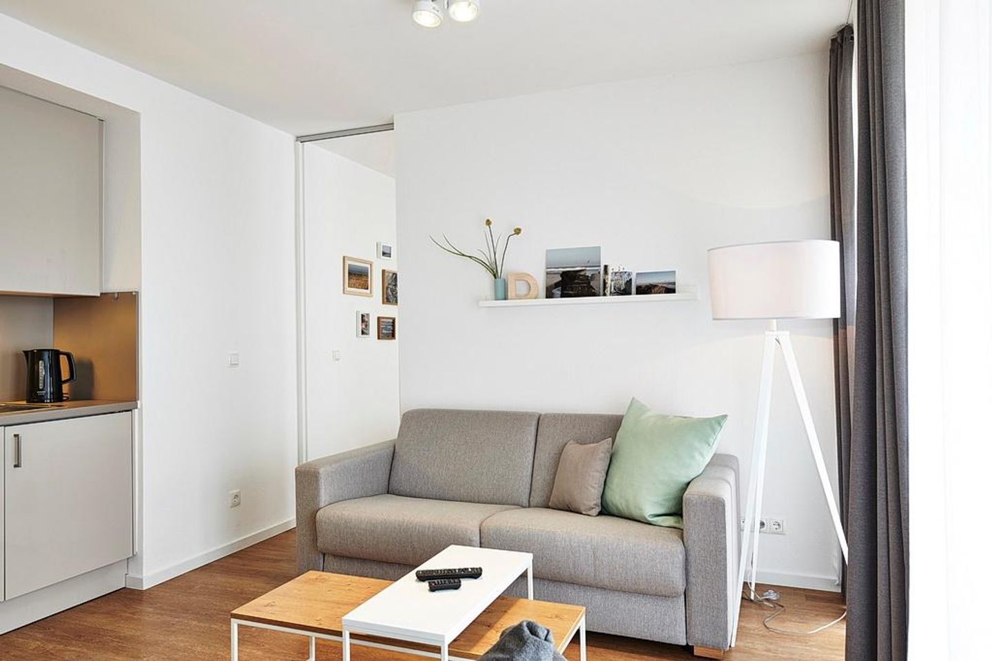 Deichhäuser Anna Küste Deichhäuser Anna Küste 3-13 Bensersiel - Wohnbereich mit Couch