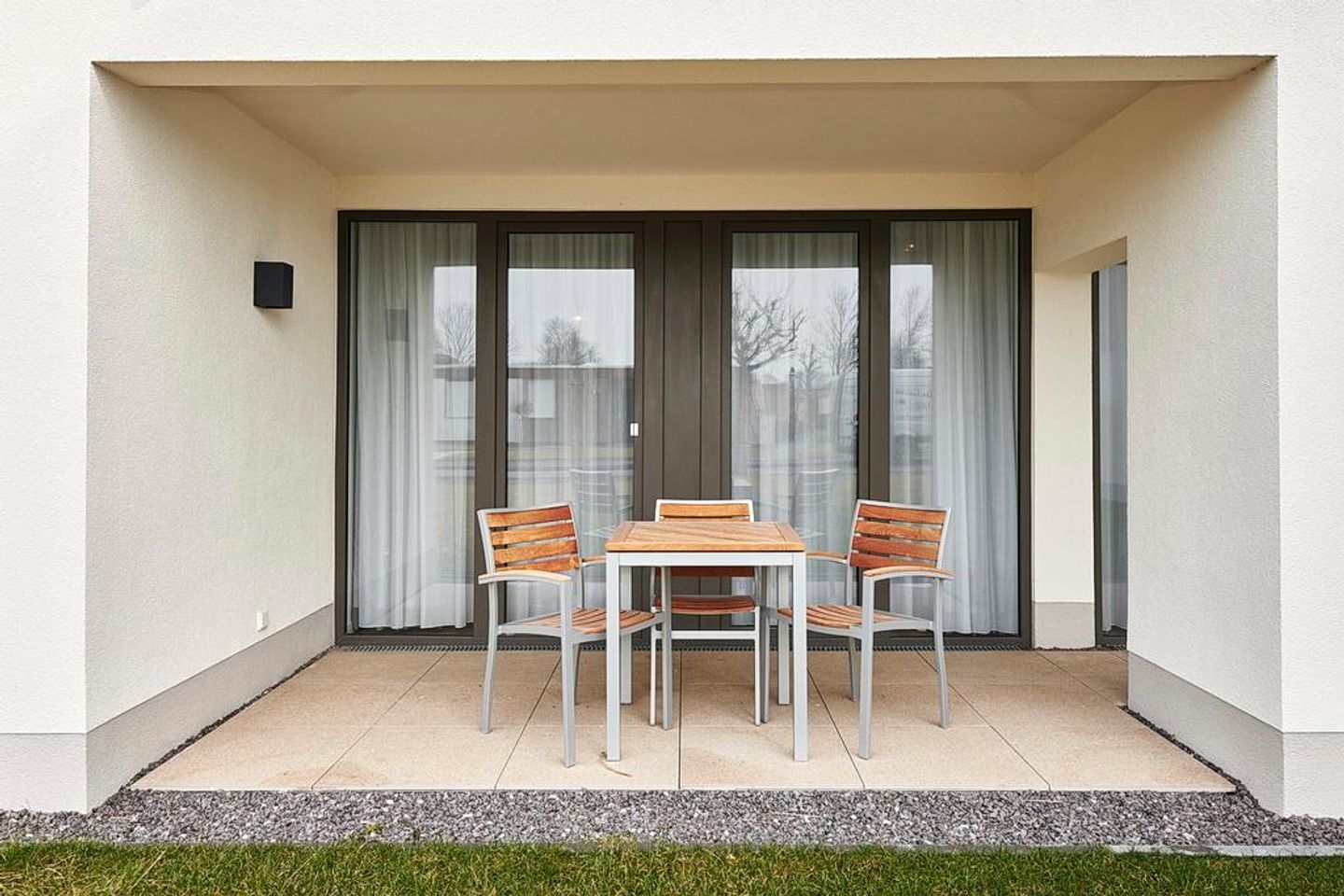 Deichhäuser Anna Küste Deichhäuser Anna Küste 3-13 Bensersiel - Terrasse mit Sitzgelegenheiten