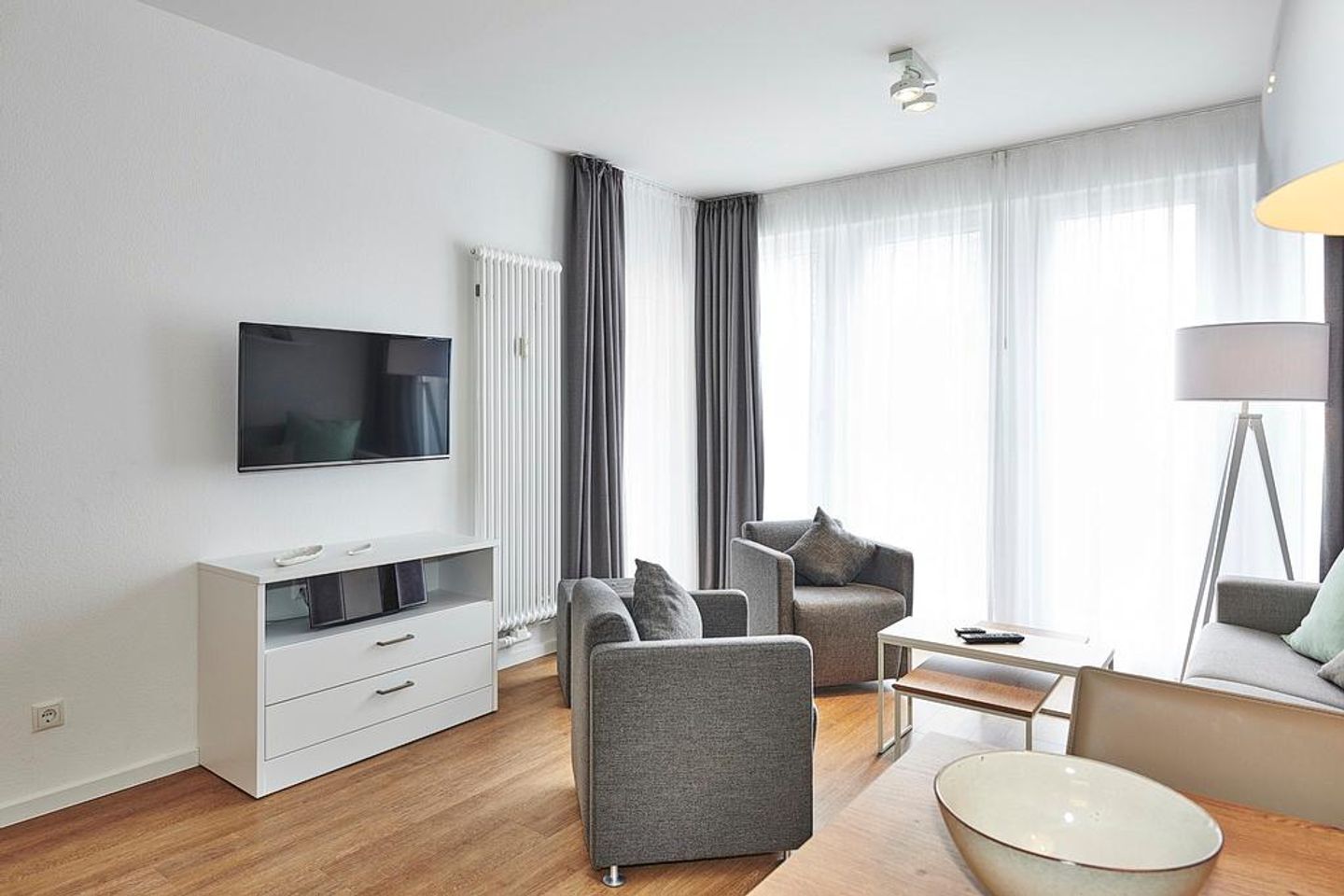 Deichhäuser Anna Küste Deichhäuser Anna Küste 3-14 Bensersiel - Wohnbereich mit Sitzgelegenheit, Flatscreen