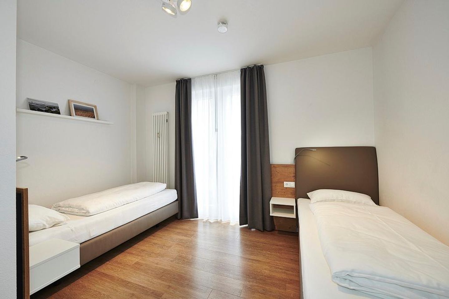 Deichhäuser Anna Küste Deichhäuser Anna Küste 3-14 Bensersiel - Schlafzimmer mit zwei Einzelbetten