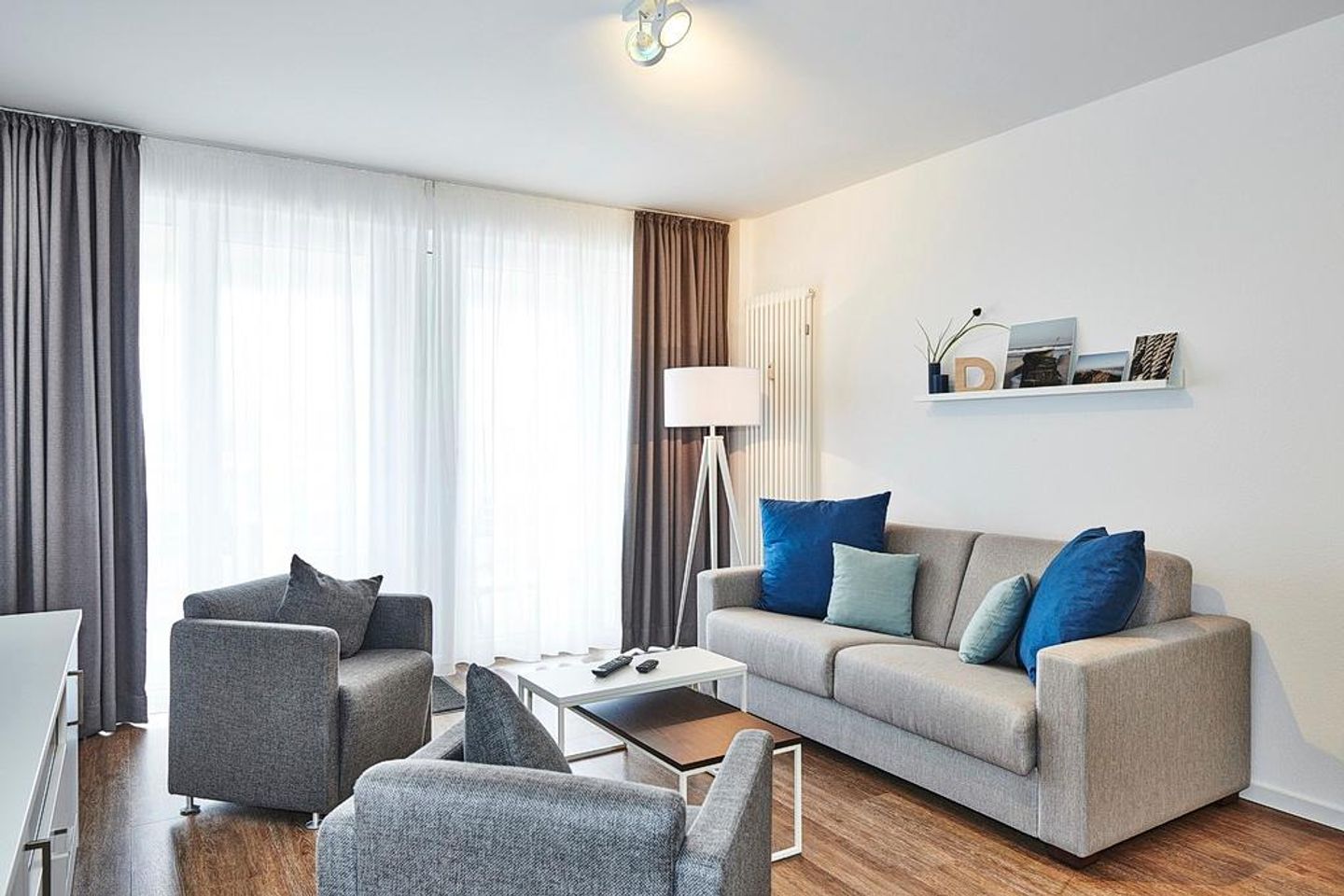 Deichhäuser Anna Küste Deichhäuser Anna Küste 3-20 Bensersiel - Wohnbereich mit Couch und Sesseln