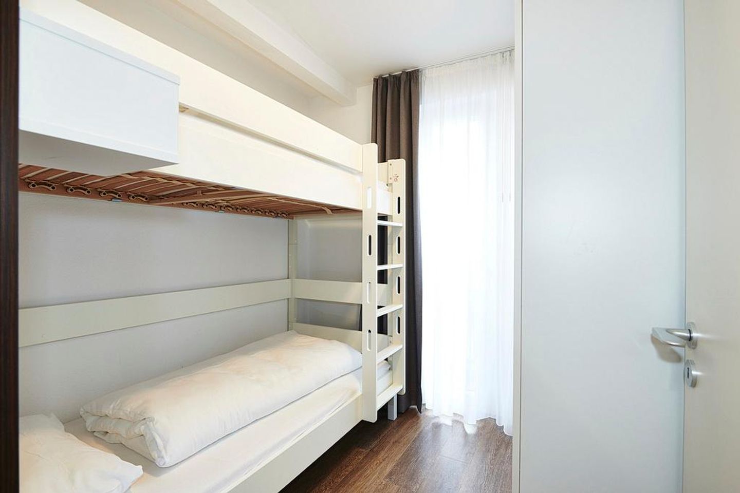 Deichhäuser Anna Küste Deichhäuser Anna Küste 3-20 Bensersiel - Schlafzimmer mit Etagenbett, Fester