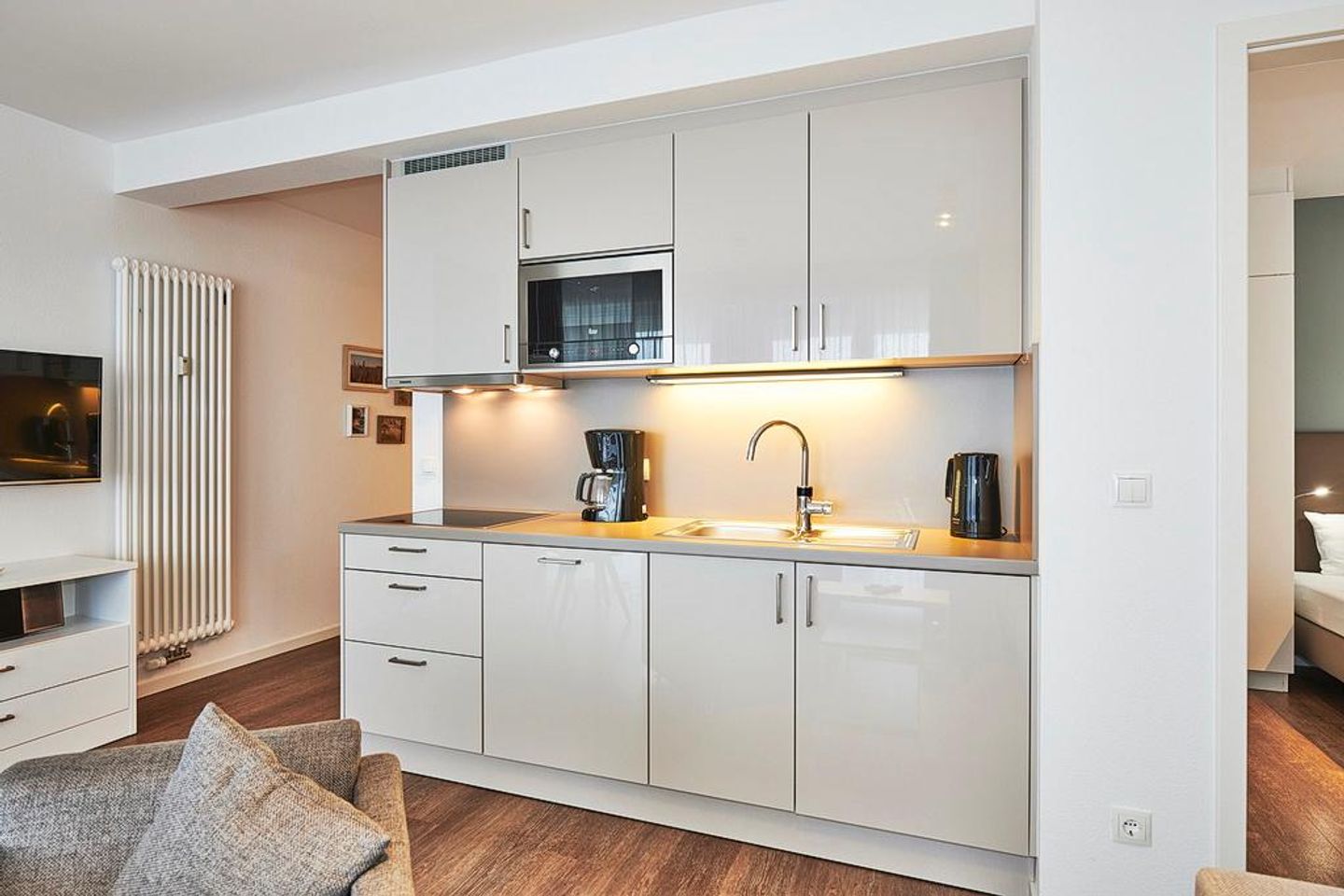 Deichhäuser Anna Küste Deichhäuser Anna Küste 3-23 Bensersiel - Küchenzeile mit Mikrowelle