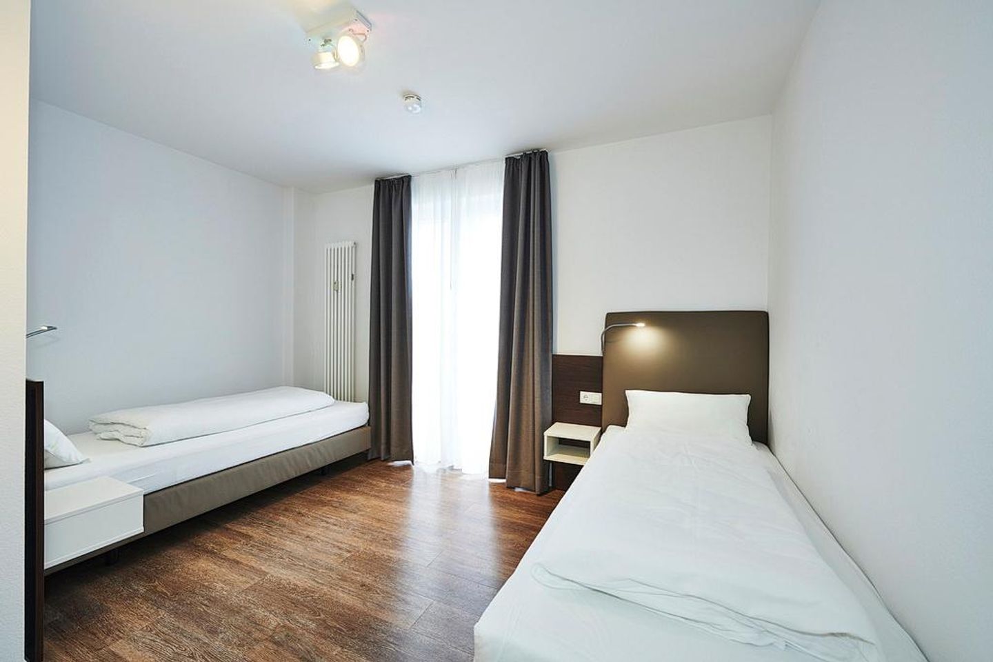 Deichhäuser Anna Küste Deichhäuser Anna Küste 3-24 Bensersiel - Schlafzimmer mit zwei Einzelbetten