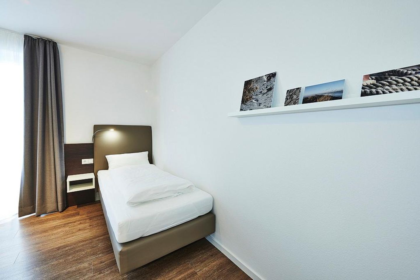 Deichhäuser Anna Küste Deichhäuser Anna Küste 3-24 Bensersiel - Schlafzimmer mit zwei Einzelbetten