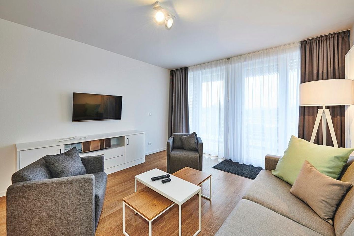 Deichhäuser Anna Küste Deichhäuser Anna Küste 3-30 Bensersiel - Wohnbereich mit Flatscreen-TV