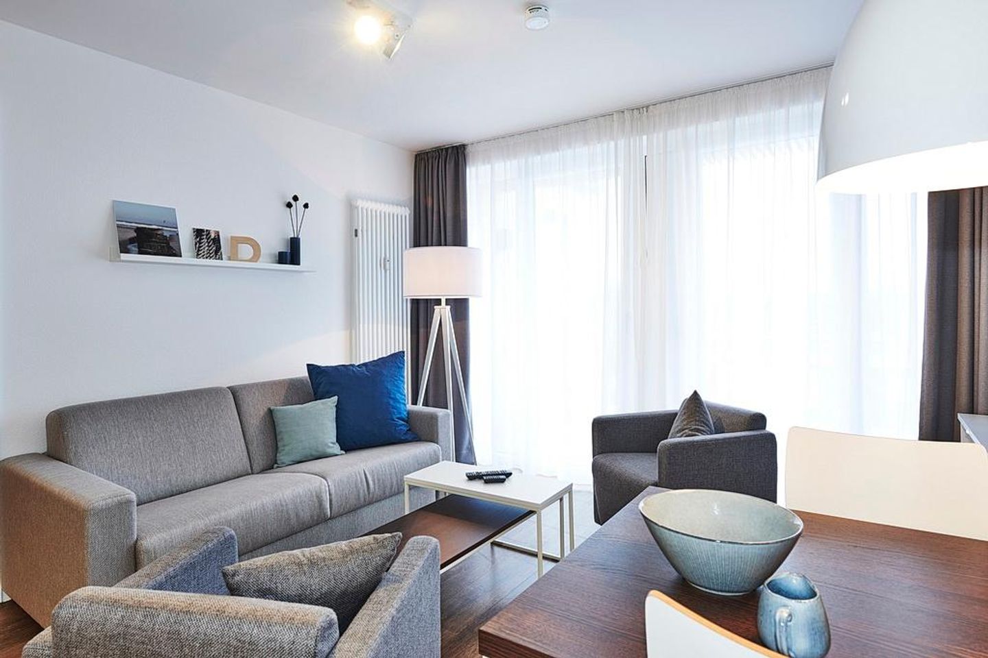 Deichhäuser Anna Küste Deichhäuser Anna Küste 3-31 Bensersiel - Wohnbereich mit Couch und Sesseln