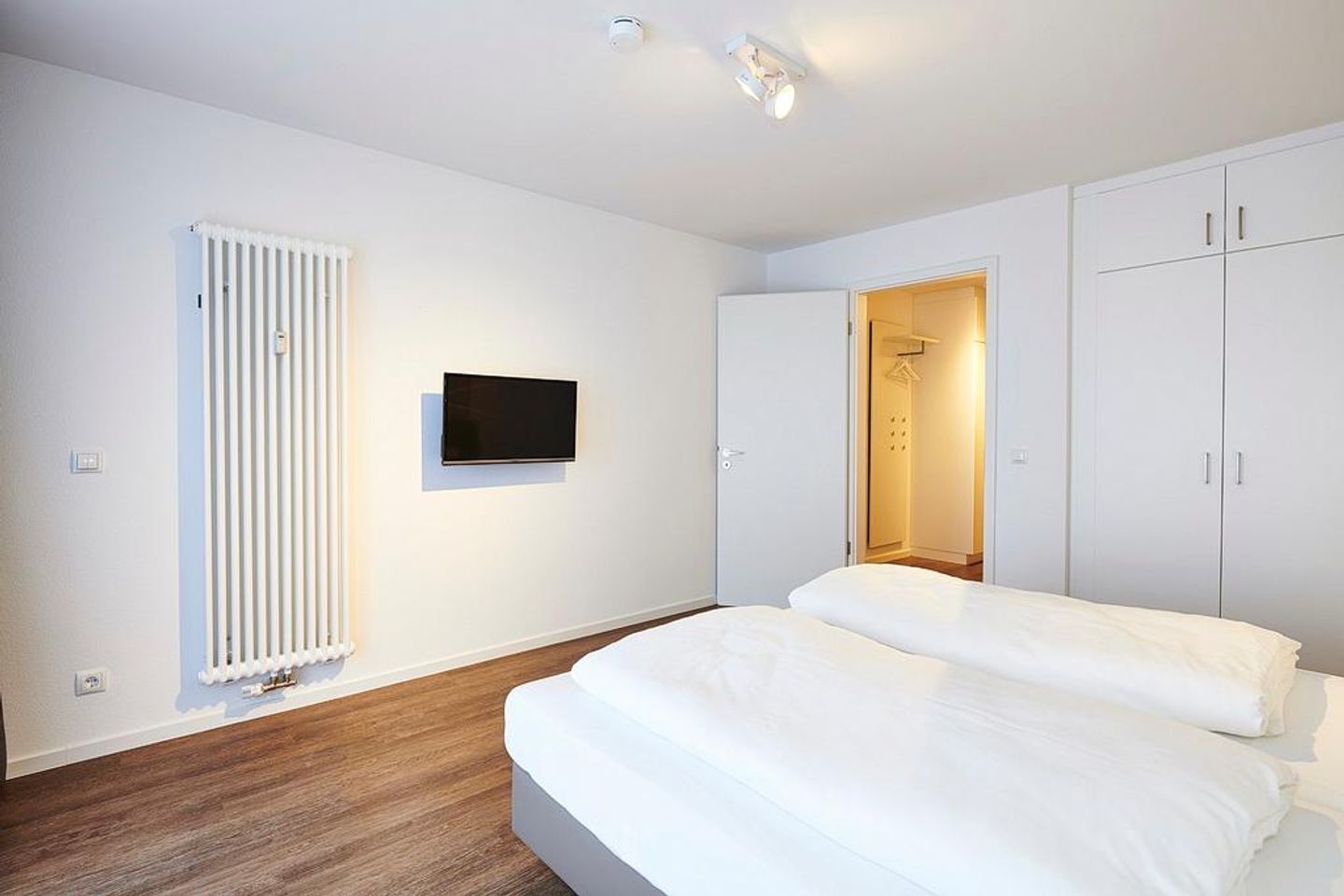 Deichhäuser Anna Küste Deichhäuser Anna Küste 3-31 Bensersiel - Schlafzimmer mit Doppelbett