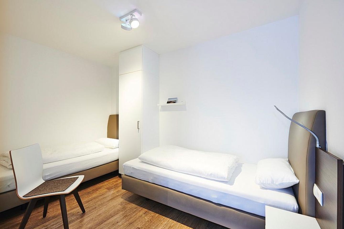 Deichhäuser Anna Küste Deichhäuser Anna Küste 3-31 Bensersiel - Schlafzimmer mit zwei Einzelbetten