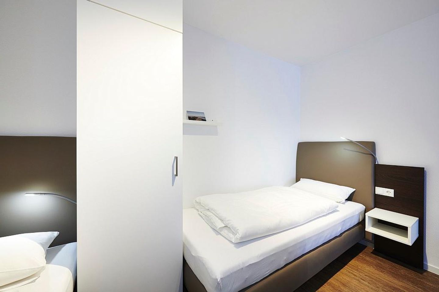 Deichhäuser Anna Küste Deichhäuser Anna Küste 3-31 Bensersiel - Schlafzimmer mit zwei Einzelbetten