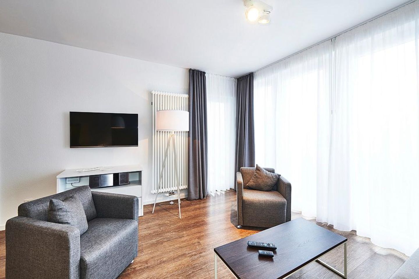 Deichhäuser Anna Küste Deichhäuser Anna Küste 3-34 Bensersiel - Wohnbereich mit Flatscreen-TV