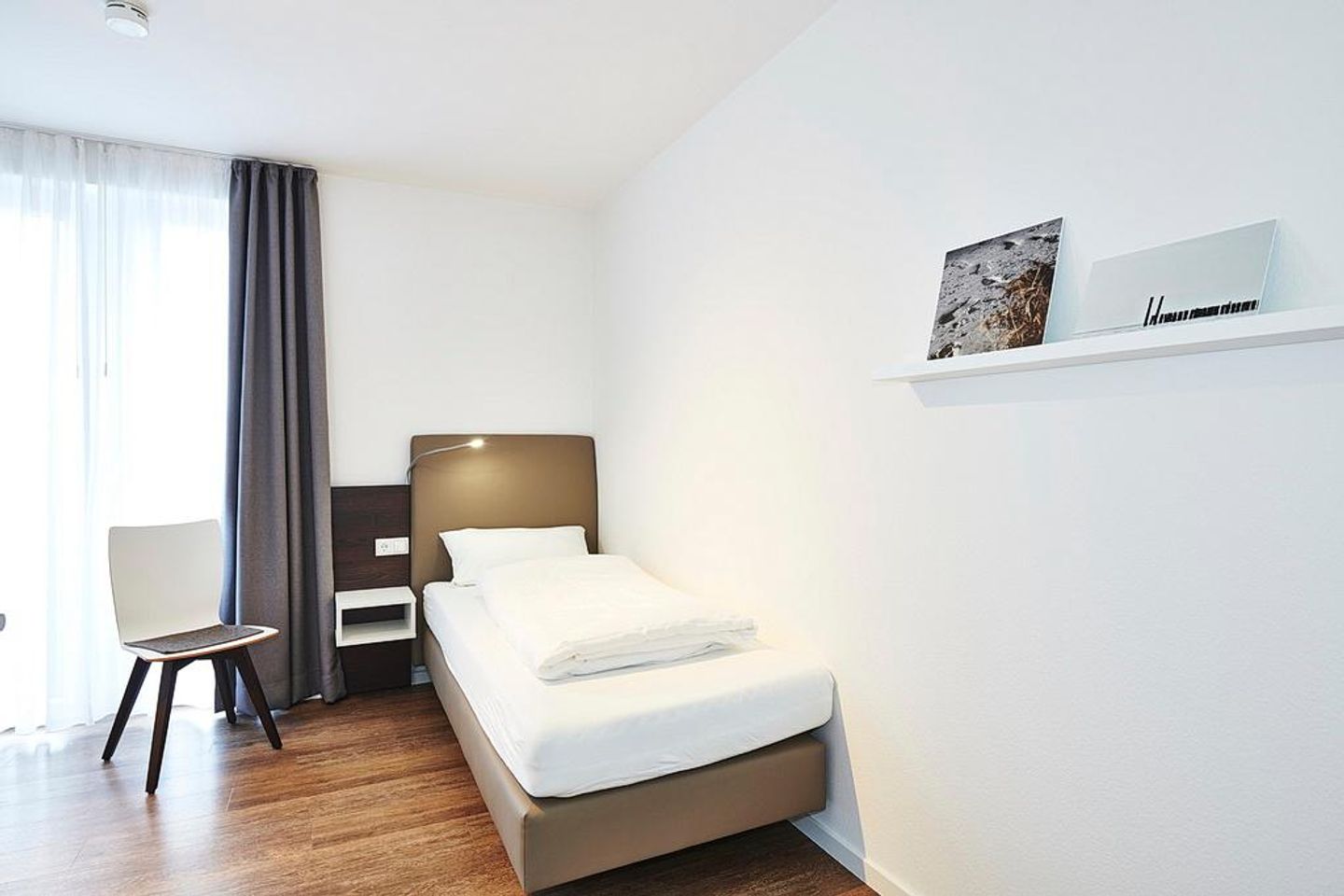 Deichhäuser Anna Küste Deichhäuser Anna Küste 3-34 Bensersiel - Schlafzimmer mit zwei Einzelbetten