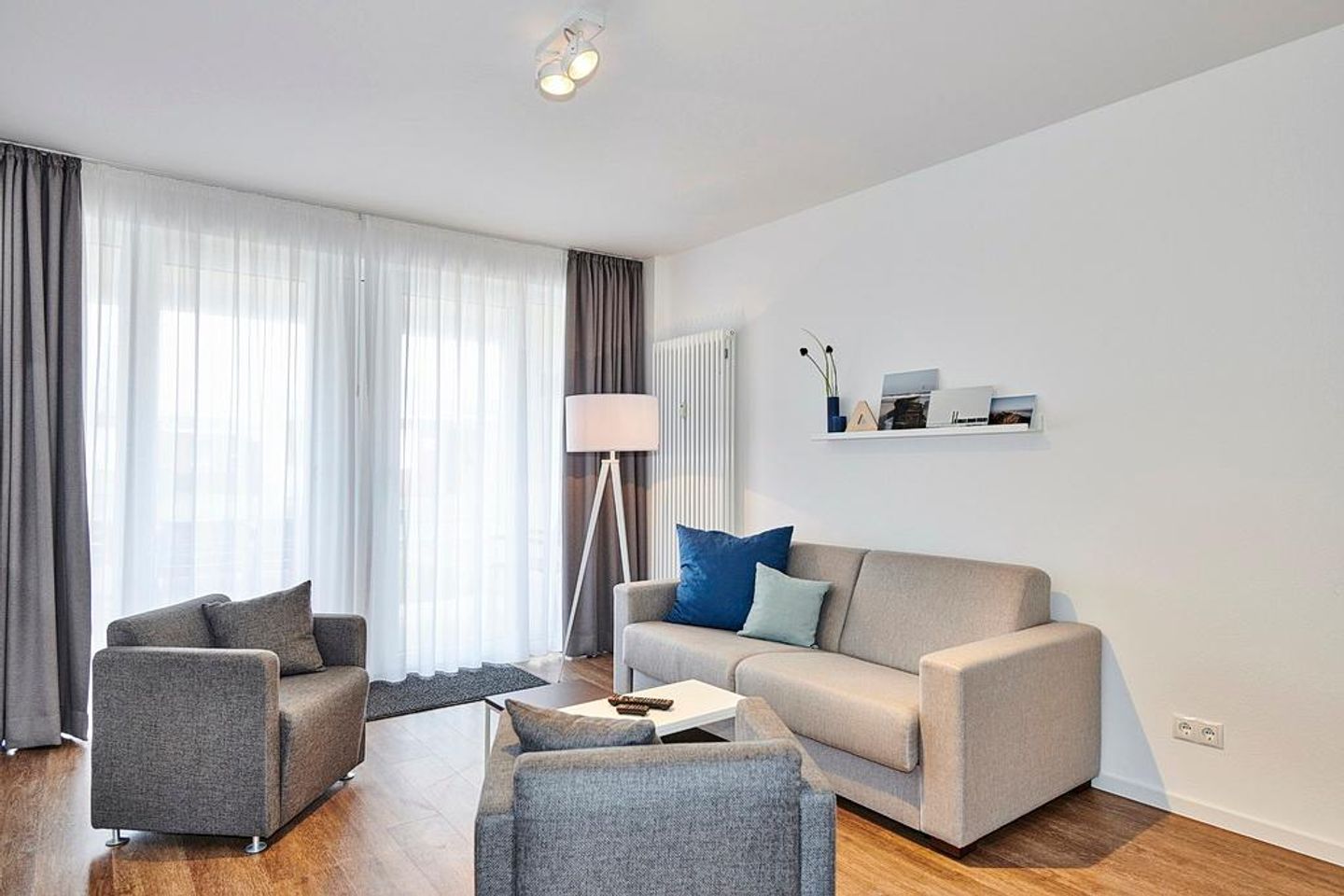 Deichhäuser Anna Küste Deichhäuser Anna Küste 4-10 Bensersiel - Wohnbereich mit Sitzgelegenheit