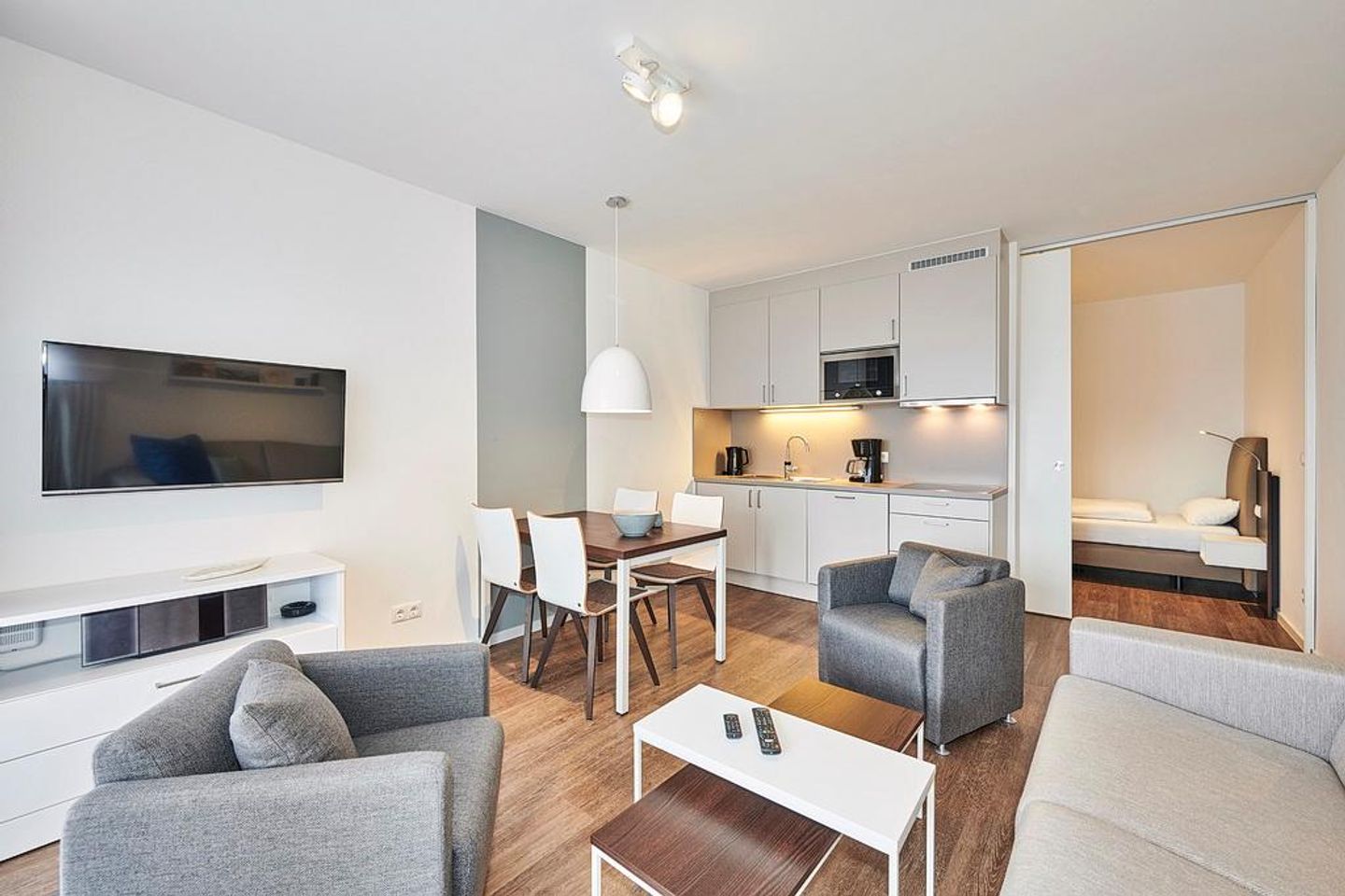 Deichhäuser Anna Küste Deichhäuser Anna Küste 4-11 Bensersiel - Wohn-Essbereich mit Küchenzeile